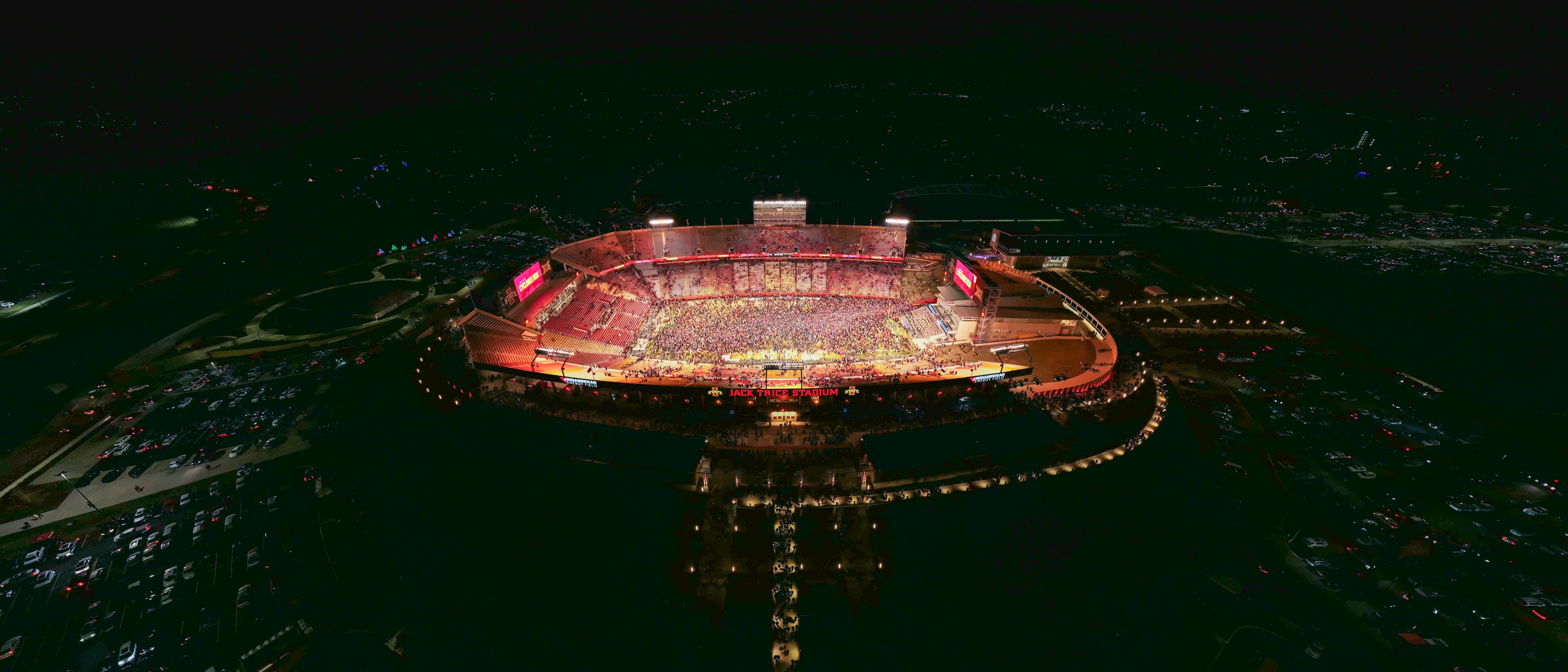 Aerial night view of a full stadium crowd during a game